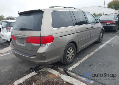 2010 Honda Odyssey Ex-L z USA, uszkodzony, nr VIN 5FNRL3H74AB055796